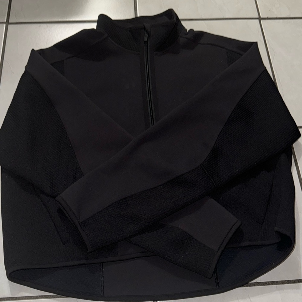 Mixed fabric embossed black sweater